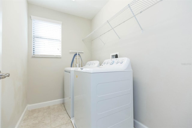 washroom featuring independent washer and dryer