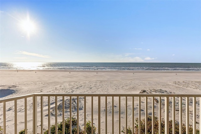 property view of water featuring a beach view