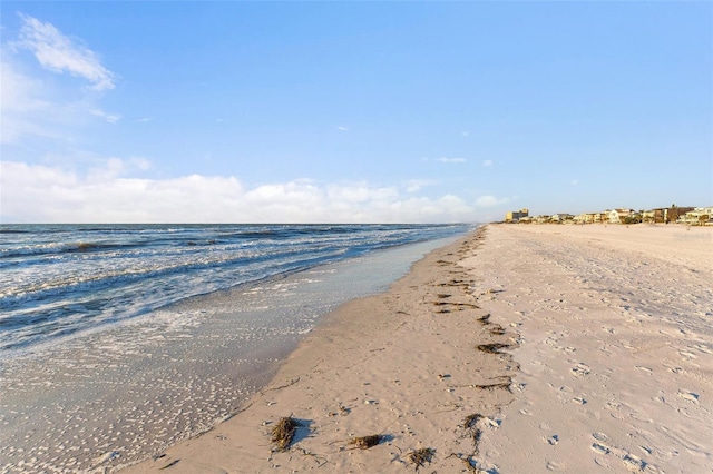 property view of water featuring a beach view