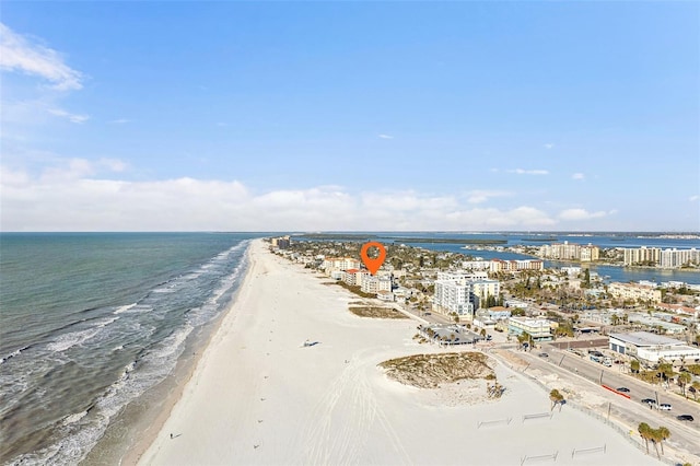 aerial view featuring a view of the beach and a water view