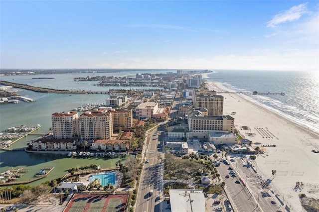 birds eye view of property featuring a water view and a view of the beach