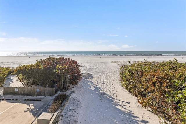 property view of water featuring a beach view