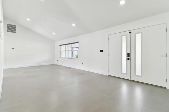 foyer featuring lofted ceiling