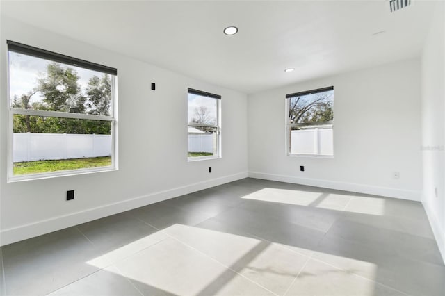 empty room featuring tile patterned floors