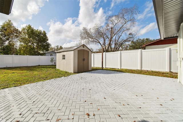 view of patio / terrace with a storage unit