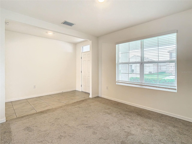 view of tiled spare room