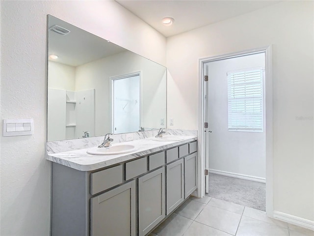 bathroom featuring vanity and tile patterned floors