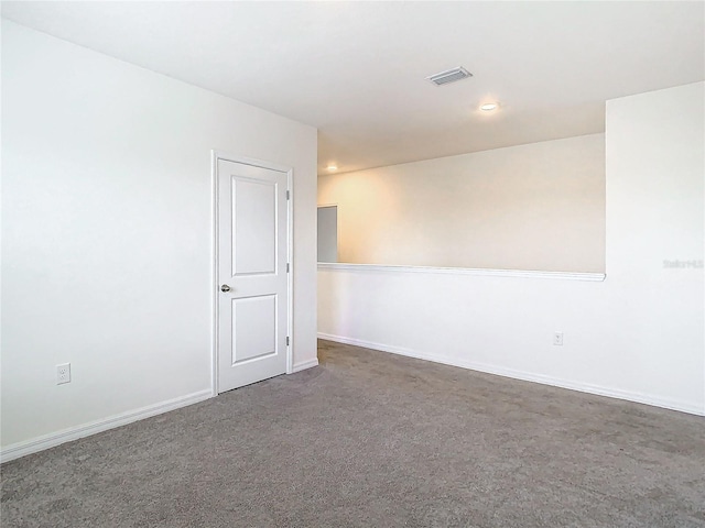 unfurnished room with carpet floors