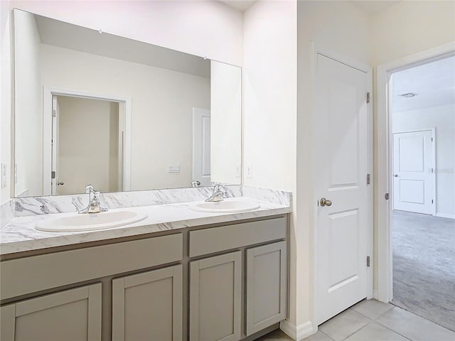 bathroom featuring tile patterned floors and vanity