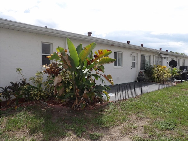 view of home's exterior featuring a patio