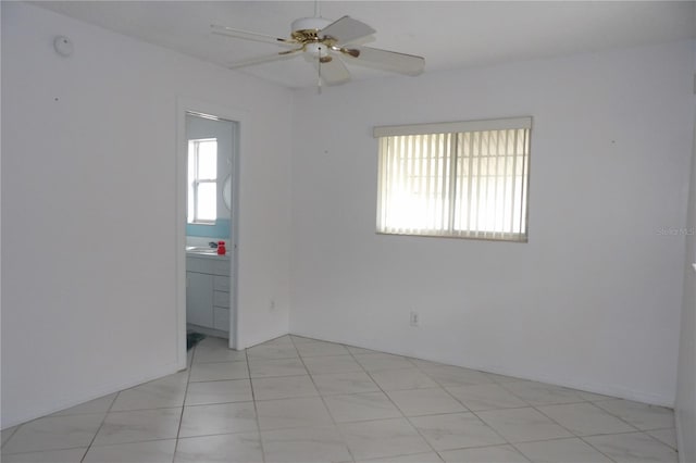 unfurnished room with ceiling fan