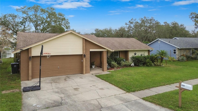 ranch-style home featuring a garage and a front yard