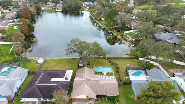 birds eye view of property featuring a water view