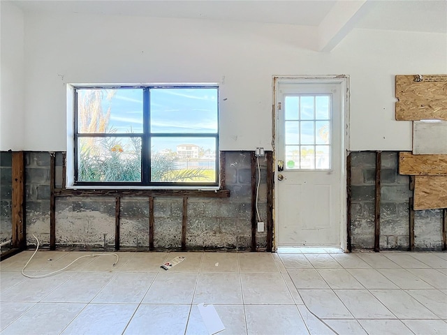 entryway with beam ceiling