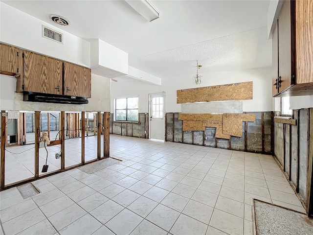 kitchen featuring light tile patterned flooring