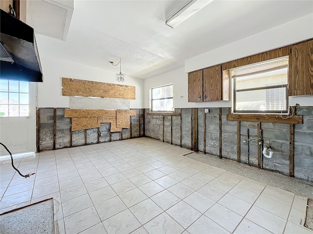 kitchen featuring a textured ceiling