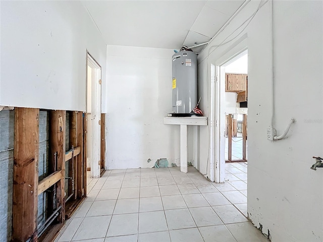 utility room featuring electric water heater