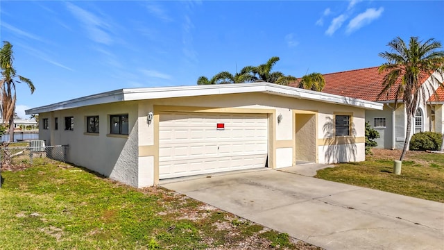 ranch-style home with a front lawn