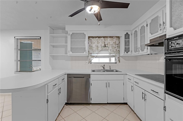 kitchen featuring kitchen peninsula, sink, white cabinets, and black appliances