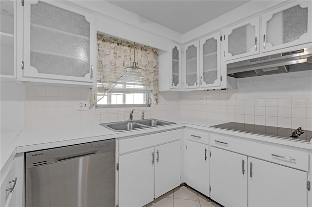 kitchen featuring black electric cooktop, white cabinetry, sink, and stainless steel dishwasher