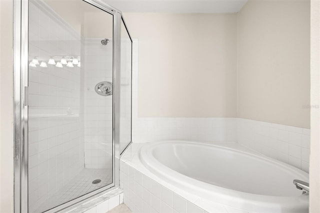 bathroom with independent shower and bath