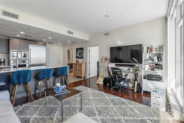 living room featuring dark hardwood / wood-style floors