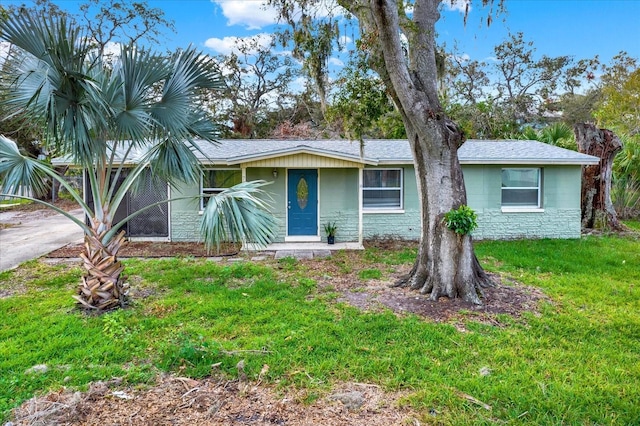 ranch-style house with a front yard