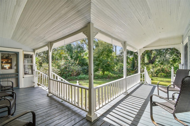 wooden terrace with a porch