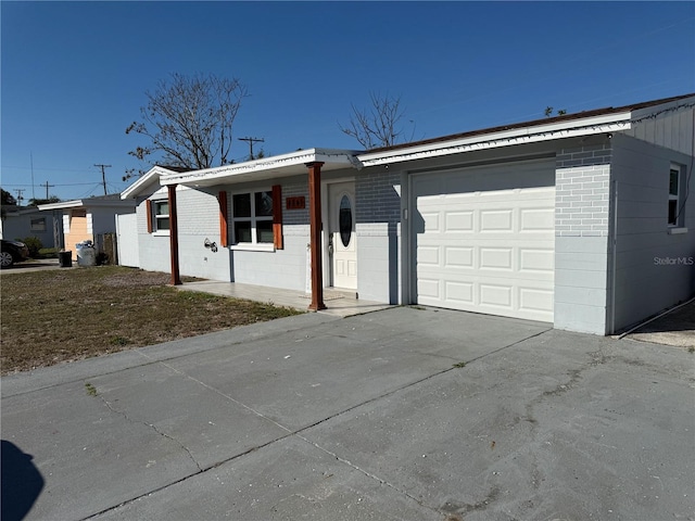 ranch-style home with a garage