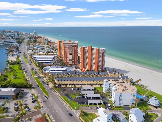 bird's eye view with a water view and a view of the beach