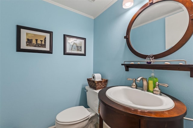 bathroom featuring vanity, toilet, and crown molding