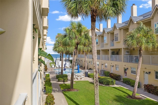 view of property with a community pool