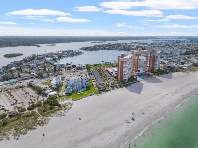 birds eye view of property featuring a water view and a view of the beach