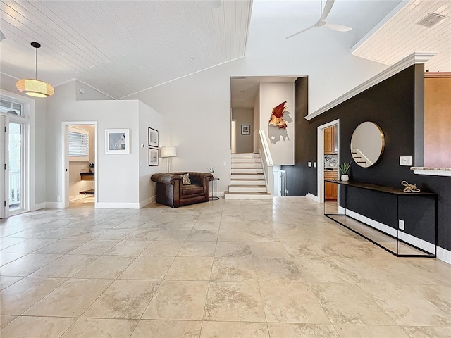 entrance foyer featuring ceiling fan, wooden ceiling, and high vaulted ceiling