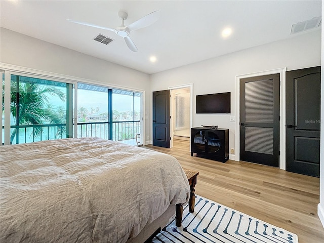 bedroom featuring ceiling fan, access to outside, and light hardwood / wood-style flooring