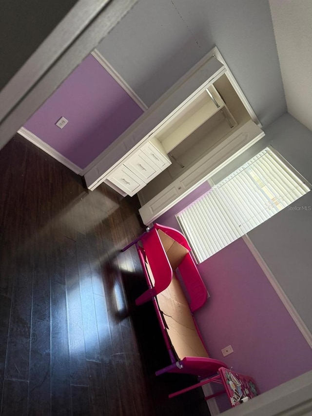 unfurnished living room featuring hardwood / wood-style floors