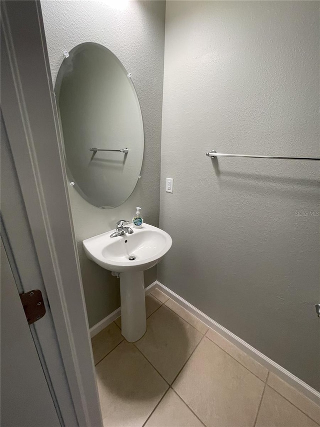 bathroom featuring tile patterned flooring