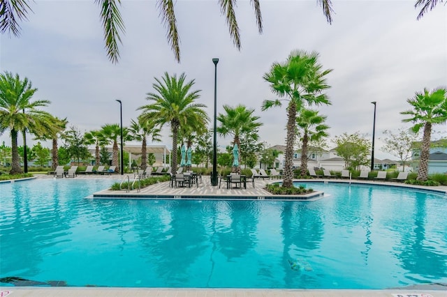 view of swimming pool featuring a patio area