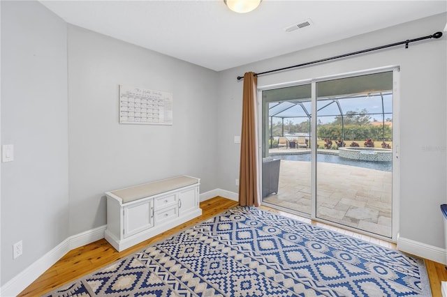 doorway featuring hardwood / wood-style floors