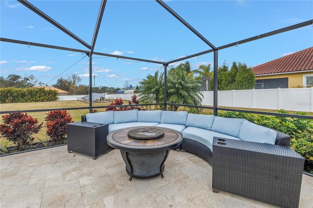 view of patio featuring a lanai and an outdoor living space