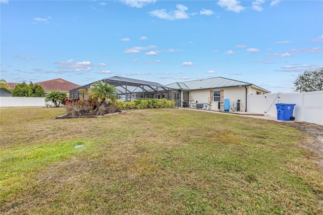 view of yard featuring a lanai