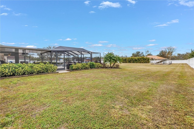 view of yard featuring a lanai