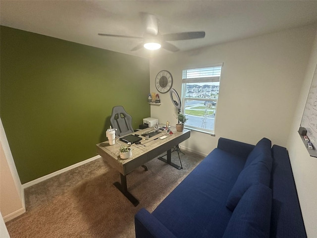 office with carpet flooring and ceiling fan