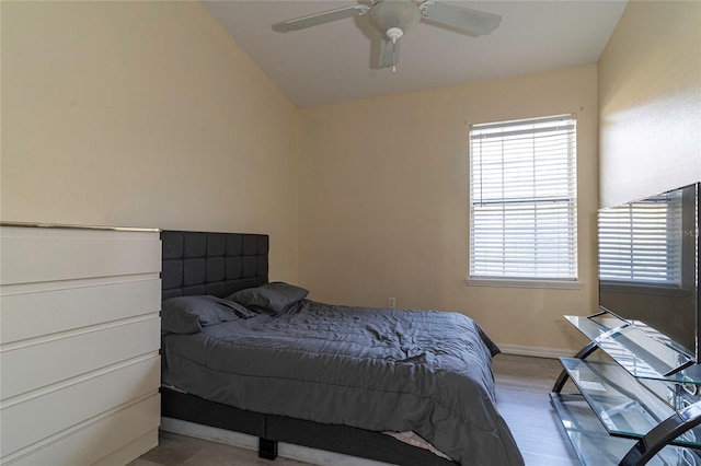 bedroom featuring vaulted ceiling and ceiling fan