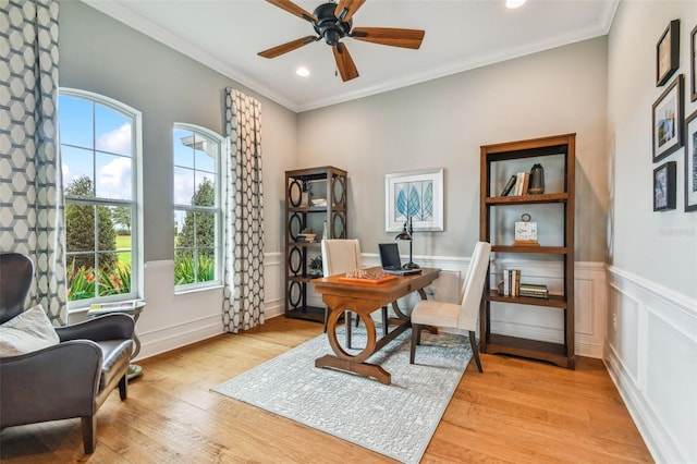 office area with ceiling fan, light hardwood / wood-style flooring, and ornamental molding