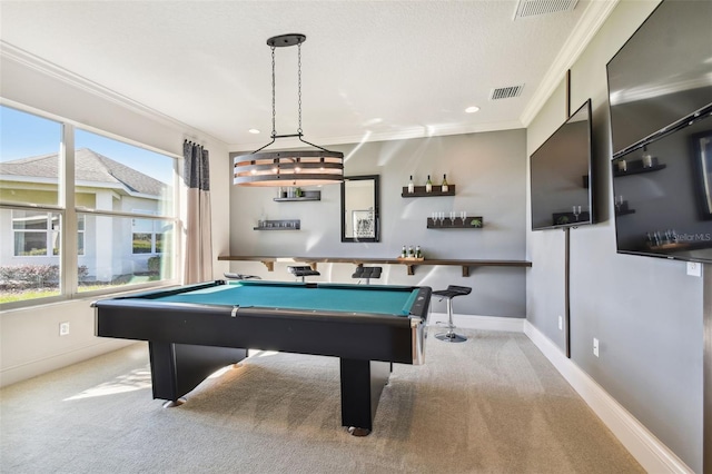 rec room featuring light colored carpet, a wealth of natural light, crown molding, and pool table