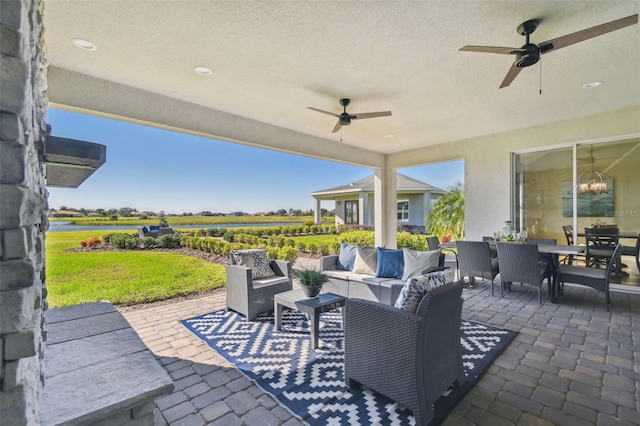 view of patio / terrace featuring outdoor lounge area and ceiling fan