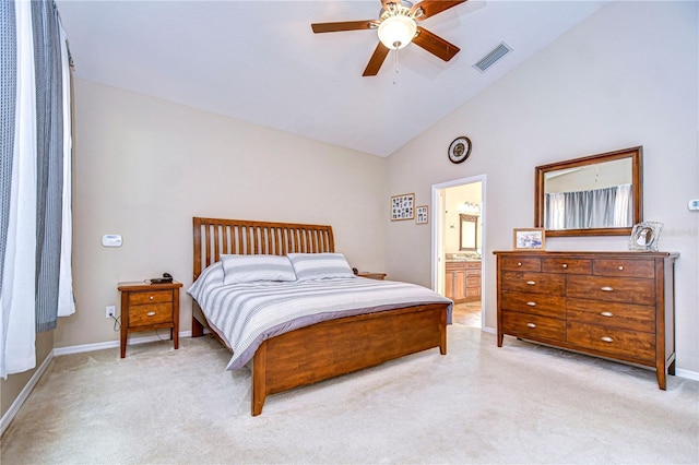 bedroom featuring visible vents, connected bathroom, ceiling fan, vaulted ceiling, and light carpet