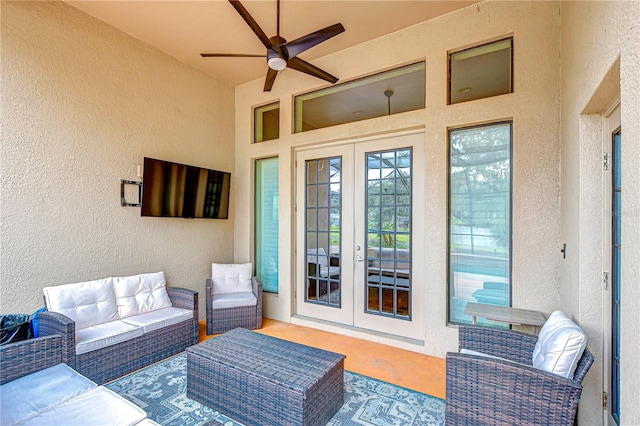 view of patio featuring an outdoor living space, french doors, and ceiling fan