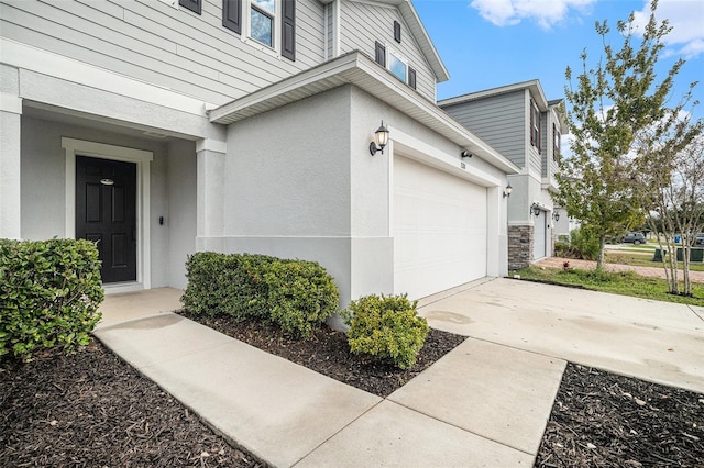 entrance to property featuring a garage